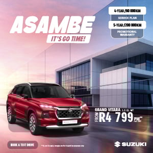 Suzuki Grand Vitara in front of building