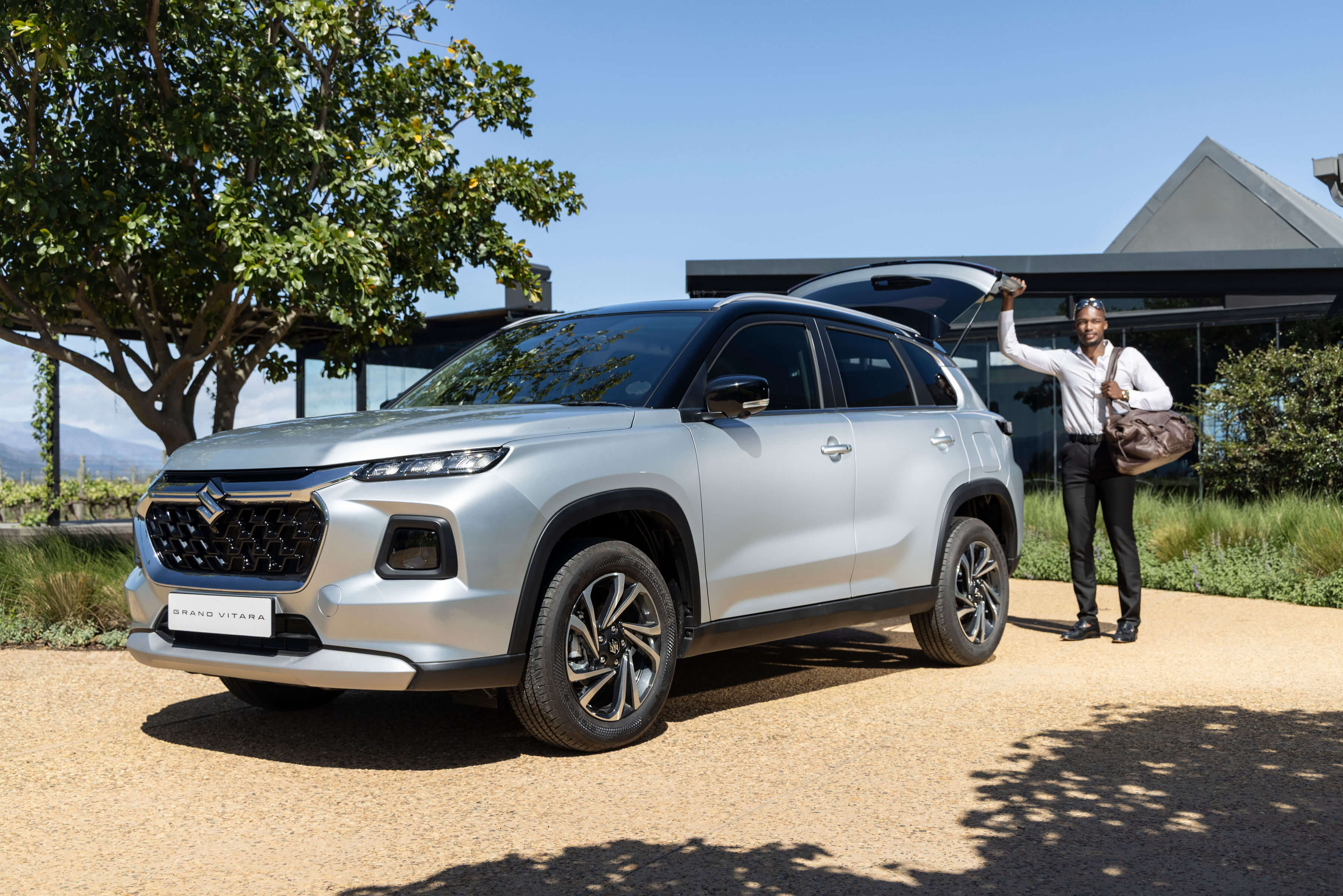 suzuki-grand-vitara-with-man-opening-the-boot