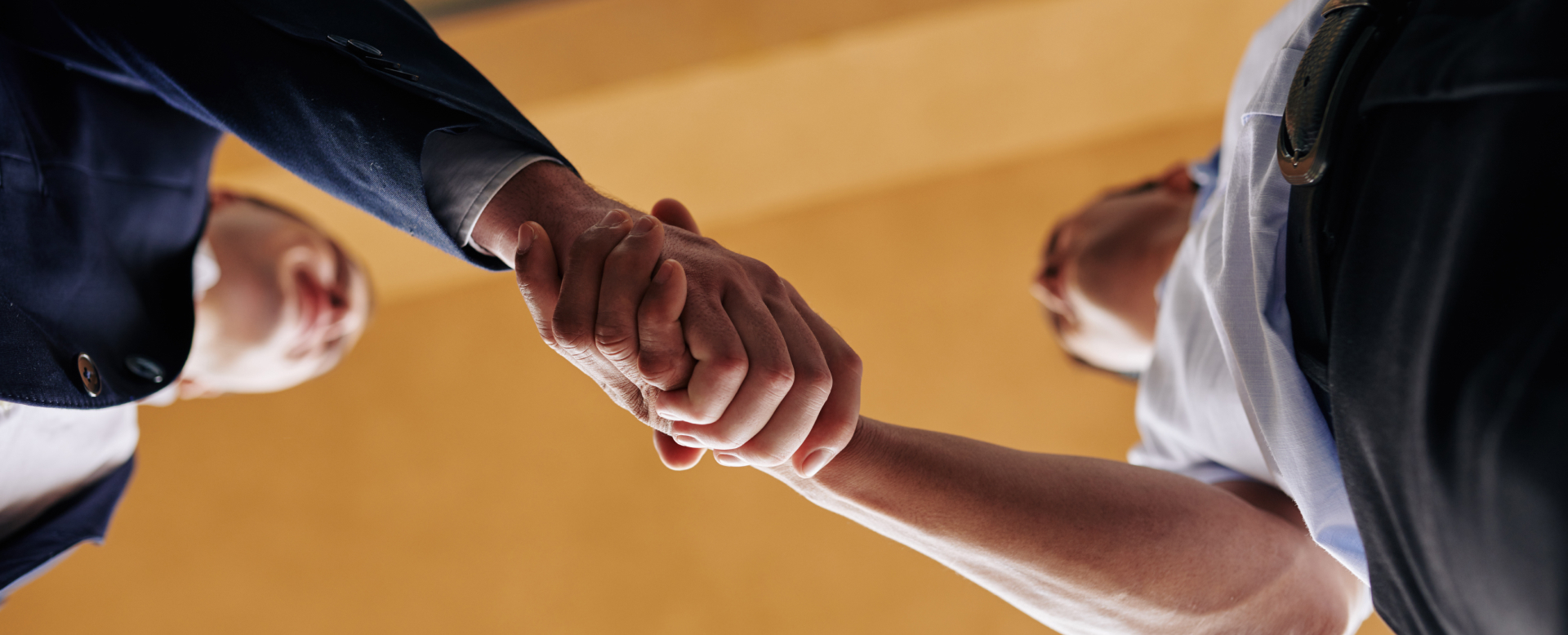 two men shaking hands